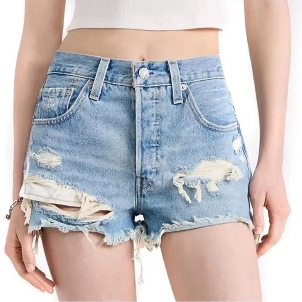 Levi’s 501 premium button fly distressed cutoff shorts. Size 24